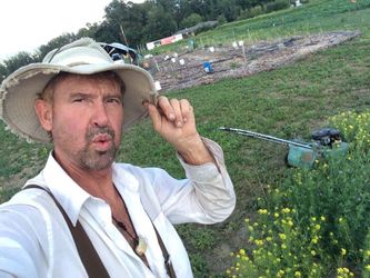 So much for no weeds in the garden. Still have to mow around it.