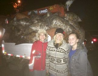 The Leaf Crew! We managed to get 75 bags into this load. One of many to cover
the ground into deep mulch for the winter.