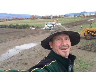 Farmers turn their field. We have to turn ours 90degrees from North/South to
East/West. Tons of organic compost needs to be moved to cover the freshly tilled
soil before weeds start to grow again.